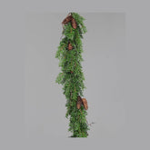 Mesterséges nemes fenyőágakból készült, tobozokkal díszített girland.